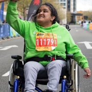 WomanGreenTopWheelchair.JPG