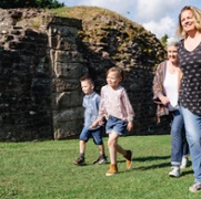 FamilyOutsideGrassyArea.jpg